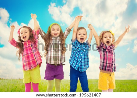 Cute happy kids are jumping together. Happiness, fashionable and friendship concept