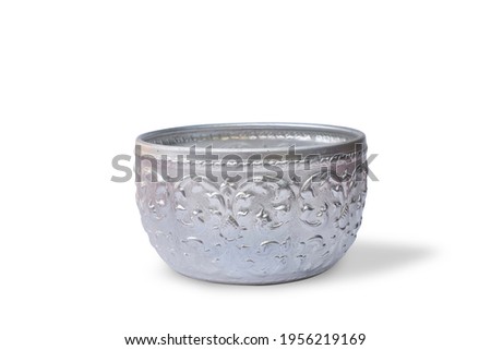 Thai traditional water bowl isolated on white background with clipping path. The style traditional water bowl is a handmade craft water container that used on Songkran day. Thai style bowl concept. Royalty-Free Stock Photo #1956219169