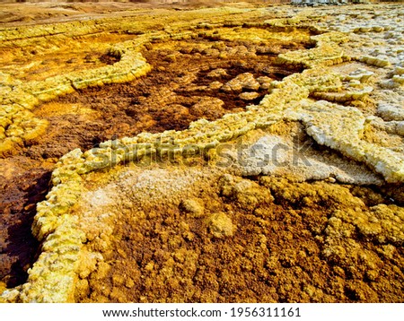 Closeup of rock patterns forming lines in nature in Danakil Depression, Ethiopia.