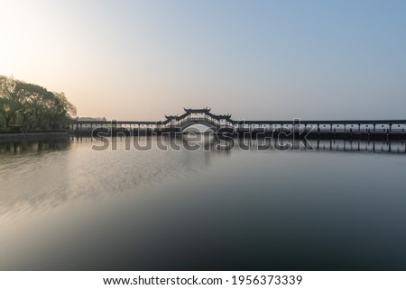 Landscapes of the ancient buildings in Jinxi in the morning,  a historic canal town in southwest Kunshan, Jiangsu Province, China. Chinese characters translation for "Ancient lotus bridge"
