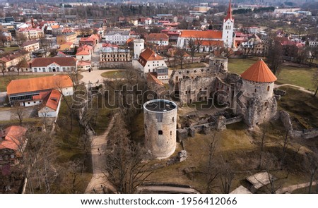Thun Castle in Cesis from above - amazing drone footage Royalty-Free Stock Photo #1956412066