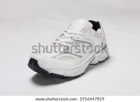 black grey sports shoes isolated on white background