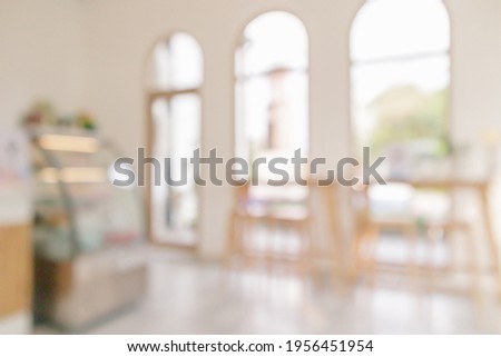 Coffee shop or cafe restaurant interior blur for background Royalty-Free Stock Photo #1956451954