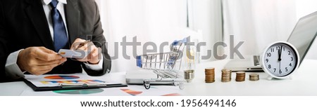 Businesswoman use laptop ,analytics and financial and bank technology concept, chart from computer laptop,Business growth concept