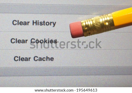 An eraser pointing to a clear internet history options on a computer screen. Royalty-Free Stock Photo #195649613