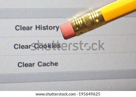 An eraser pointing to a clear internet history options on a computer screen. Royalty-Free Stock Photo #195649625