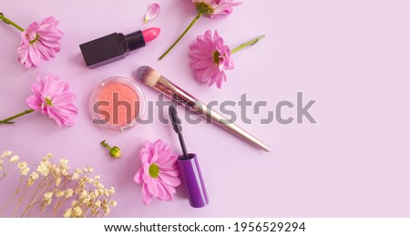  different decorative cosmetics on a light background
