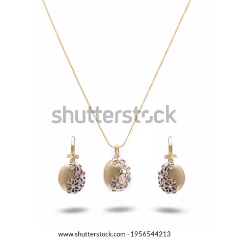 Set of Gold Accessories , Necklace and Earring , on white background 