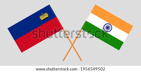 Crossed flags of Liechtenstein and India. Official colors. Correct proportion