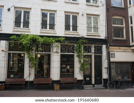 Beautiful view of Amsterdam street with typical dutch buildings. Holland
