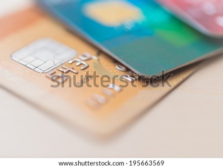 Credit cards in very shallow focus Royalty-Free Stock Photo #195663569