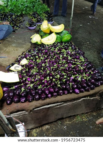 brinjals or eggplants stock in a vegetable market