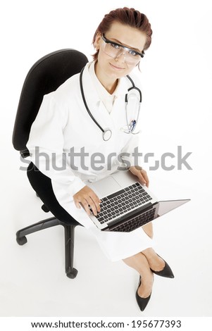 medical doctor woman with stethoscope and laptop. Isolated over white background