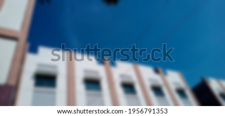 Defocused abstract background of by the sky in the daytime shopping area