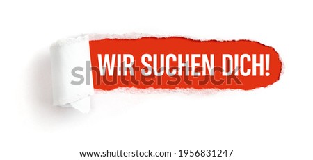 Hole in white paper with torns edges - We want you in german - Wir suchen dich Royalty-Free Stock Photo #1956831247