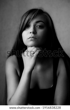black and white photo of a beautiful, elegant girl model