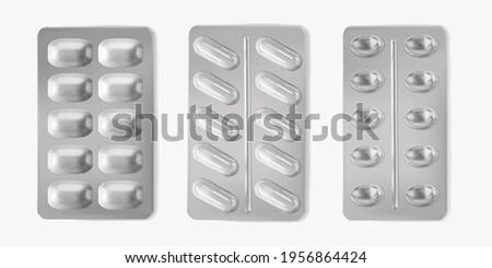 Set pills foil blisters packing 3d realistic vector illustration. Pharmaceutical mockup isolated on white background Royalty-Free Stock Photo #1956864424