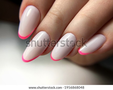 micro french pink nails manicure fingernails  Royalty-Free Stock Photo #1956868048