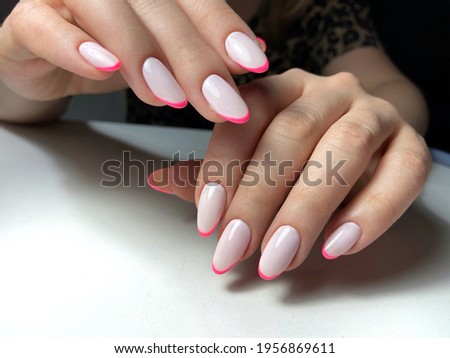 manicure french pink nails beauty salon finger Royalty-Free Stock Photo #1956869611