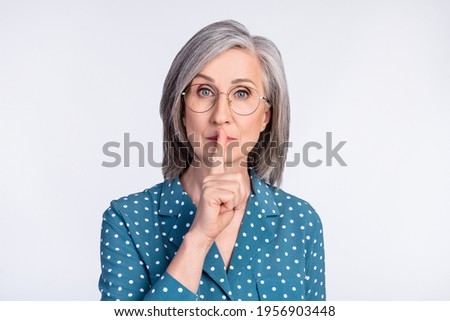Photo of serious old woman hold finger mouth lips silence tell secret isolated on grey color background Royalty-Free Stock Photo #1956903448
