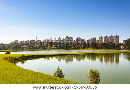 Curitiba, Parana, Brazil - April 10th: Par. City park view in South America city. Parque Barigui, Barigui Park. Morning nature scene. Daylight panorama.  Colorful landscape. Royalty-Free Stock Photo #1956909556
