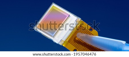 Image  imaging sensor is a sensor that detects and conveys the information that constitutes an image. CCD or CMOS technology Royalty-Free Stock Photo #1957046476