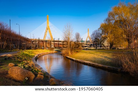 Boston City Garden Landscape with Zakim Bridge over the North Point Park Canal on Charles River.