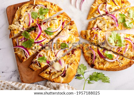 Barbecue chicken flatbreads with red onion and cilantro Royalty-Free Stock Photo #1957188025