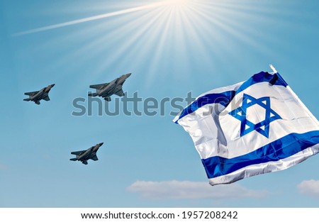 Israeli flag and modern militaristic fighters, blue sky background, Concept of Independence Day