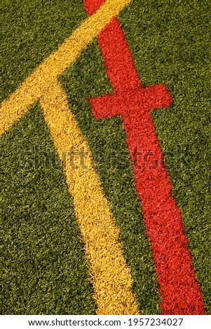 Berkeley Heights, NJ USA - March 22, 2021: Multi-purpose artificial turf fields are covered with colorful markings allowing athletes to play a variety of sports like football, soccer and lacrosse.