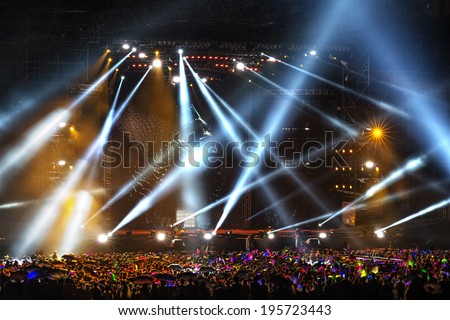 Stage Spotlight with Laser rays Royalty-Free Stock Photo #195723443