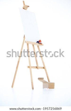 advertising stand or flip chart or blank artist easel isolated on white. art.