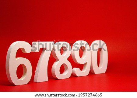 Counting numbers ( 6 7 8 9 0 ) white number wooden on Red Background with Copy Space - Six Seven Eight Nine Zero Royalty-Free Stock Photo #1957274665