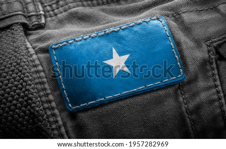 Tag on dark clothing in the form of the flag of the Somalia
