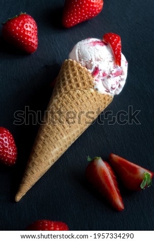 strawberry ice cream scoop in a cone homemade
