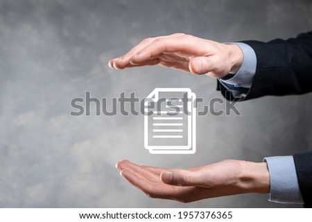 Hand holding a document icon in his hand Document Management Data System Business Internet Technology Concept. Corporate data management system DMS.