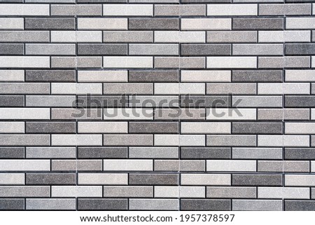 Gray brick wall as an abstract background