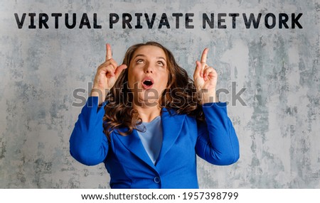 VPN concept with young woman. Business Acronym VPN as Virtual Private Network Royalty-Free Stock Photo #1957398799