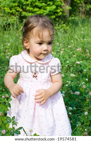 Pretty toddler girl in the park