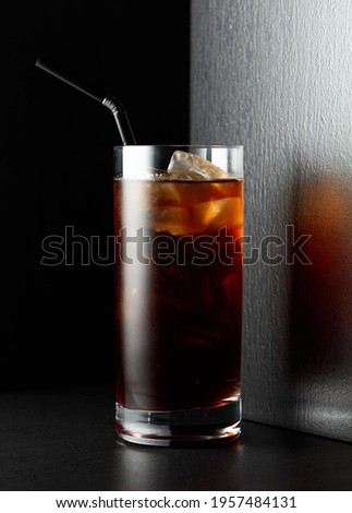 Iced coffee on a black background.