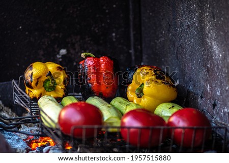 Grilled fresh vegetables. Yellow, red bell peppers and eggplant are grilled. Vegetarian BBQ.
