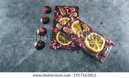 Artisan handmade chocolate. Chocolate bars with dried fruit
