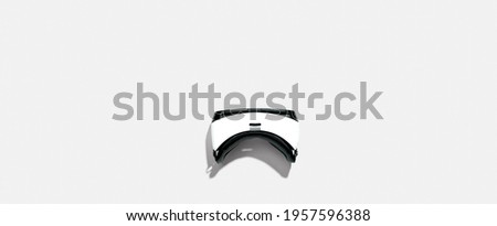 Virtual reality headset with shadow - flat lay