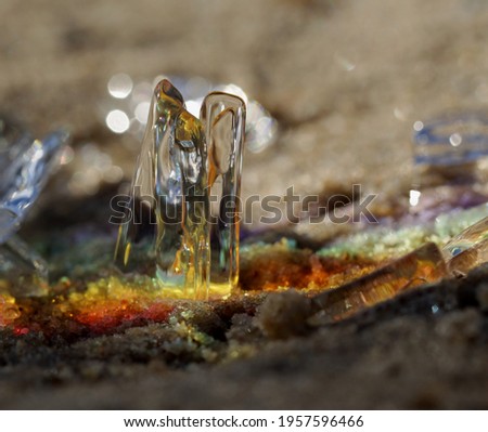 macro picture of melting ice in a prism light