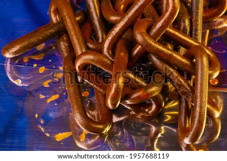  old rusty chains, living long; not young anymore. (metal object) due to rust. a connected flexible series of metal links used for fastenin Texture