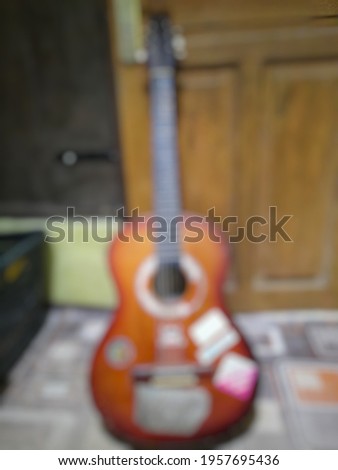Defocused abstract background of acoustic guitar