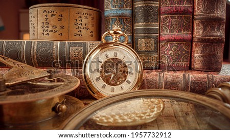 Vintage pocket watch. Vintage background Concept of time history. Royalty-Free Stock Photo #1957732912
