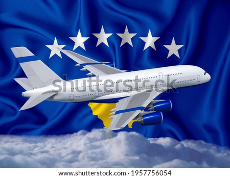 flag with white airplane and clouds. The concept of tourist international passenger transportation.