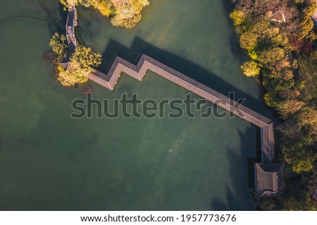 Aerial landscape of Hangzhou West Lake, the Yuhu Bay Scenic park with long covered bridge