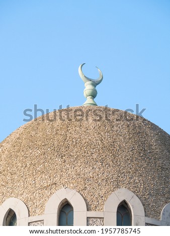 Close up with the dome and the crescent moon or Hilaal of Mosque of Constanta- Minaret, located in Constanta Romania.